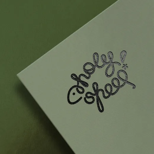 The embossed Holy Sheep! logo