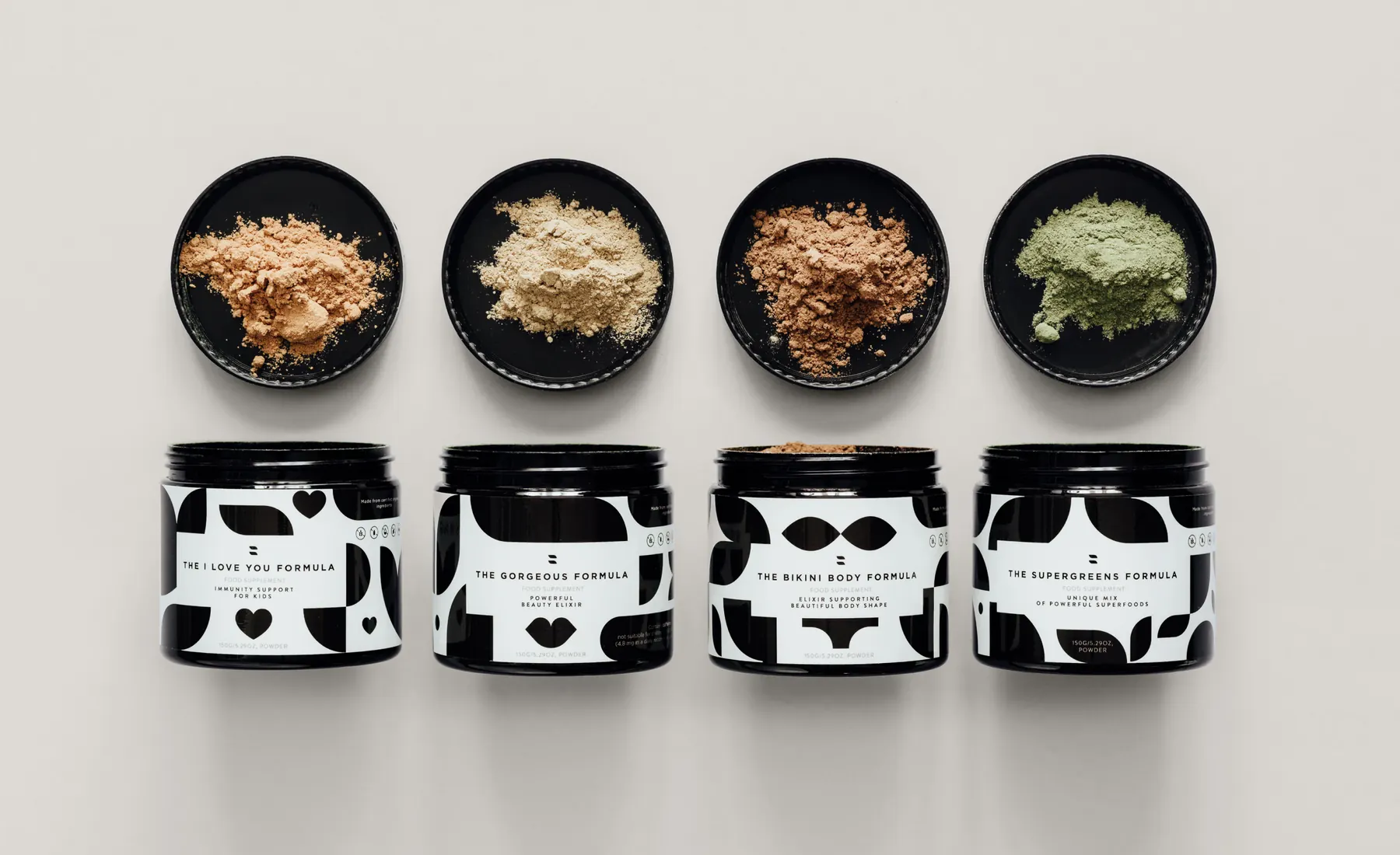 Zojo Elixirs jars with powdered supplements