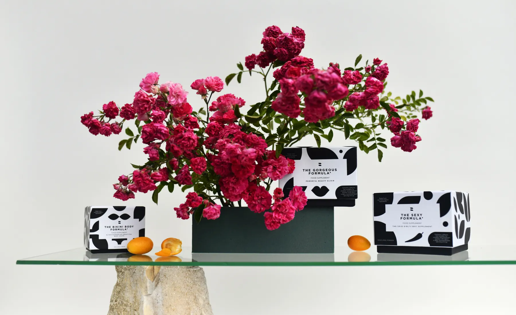 Zojo Elixirs packages with flowers